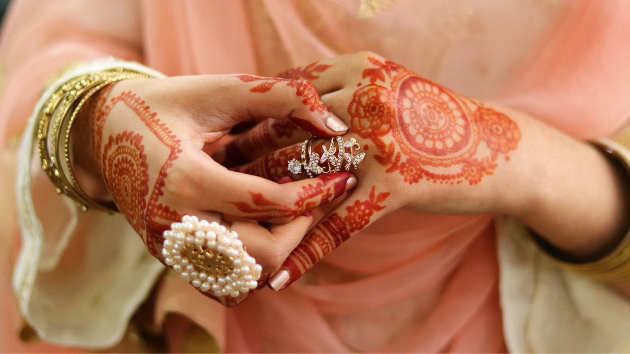 Mehndi function vibrant decoration by Soirees By Bobby